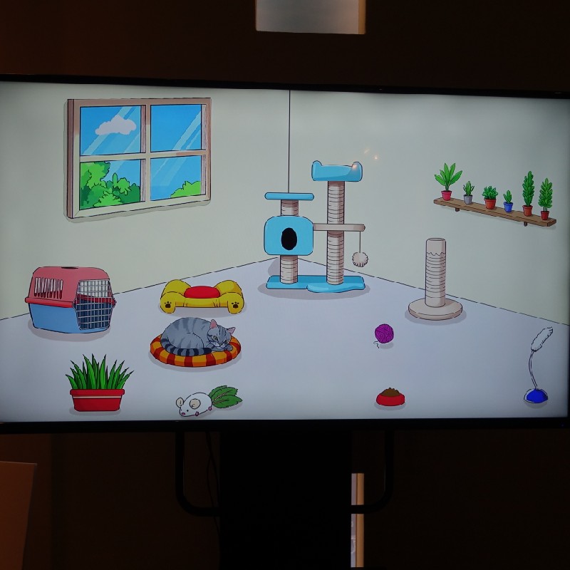 撮影して観測すると猫の居場所が１つに確定することを体験できるモニター